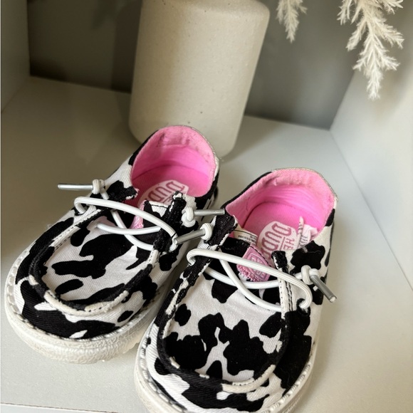 Kids Moccasins with Cow Print and Pink Lining - Picture 1 of 1